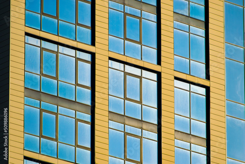 dirty glass windows of a skyscraper. the concept of the need to wash windows