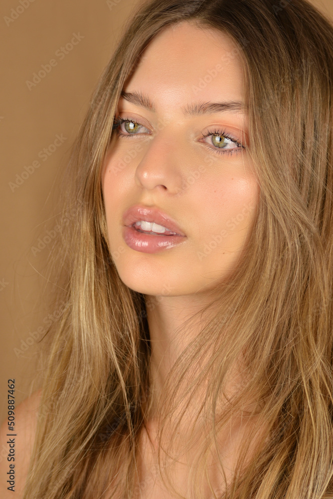 Hair and skin care. Close-up portrait of beautiful sensual young woman Hair and skin care. Close-up portrait of beautiful sensual young woman
