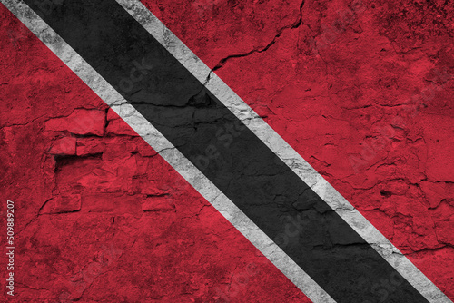 Patriotic cracked wall background in colors of national flag. Trinidad and Tobago
