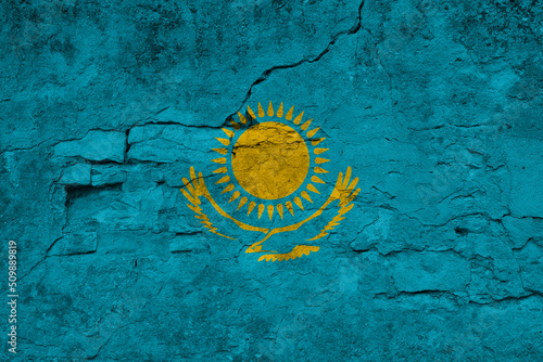 Patriotic cracked wall background in colors of national flag. Kazakhstan