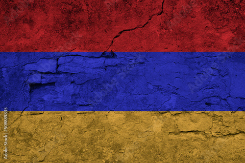 Patriotic cracked wall background in colors of national flag. Armenia