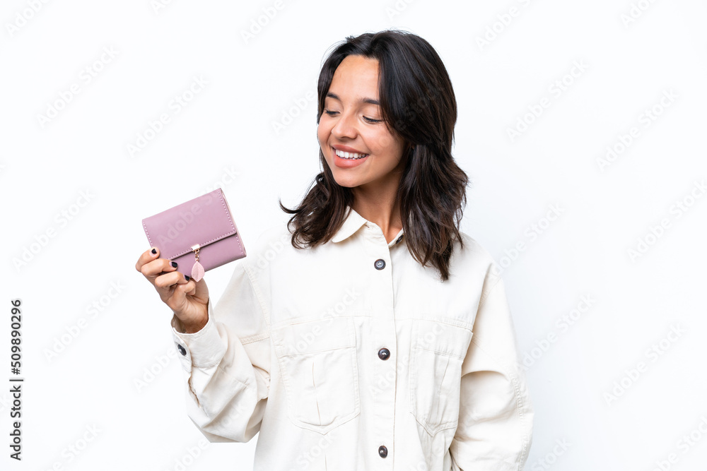 Young hispanic woman holding wallet isolated on white background looking to the side and smiling Young hispanic woman holding wallet isolated on white background looking to the side and smiling