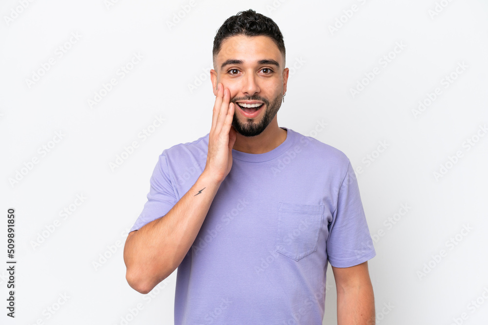 Fototapeta premium Young Arab handsome man isolated on white background with surprise and shocked facial expression
