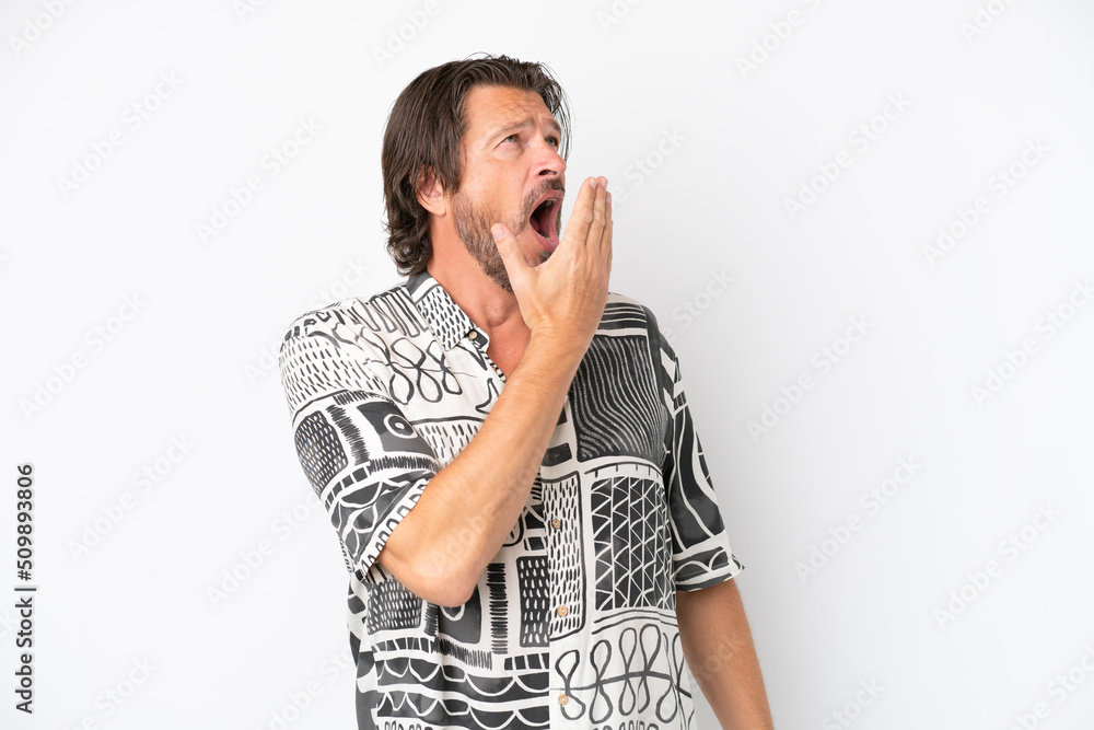 Senior dutch man isolated on white background yawning and covering wide open mouth with hand Senior dutch man isolated on white background yawning and covering wide open mouth with hand
