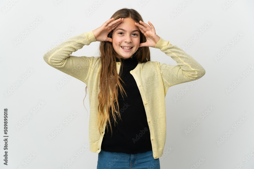 Little girl over isolated white background with surprise expression Little girl over isolated white background with surprise expression