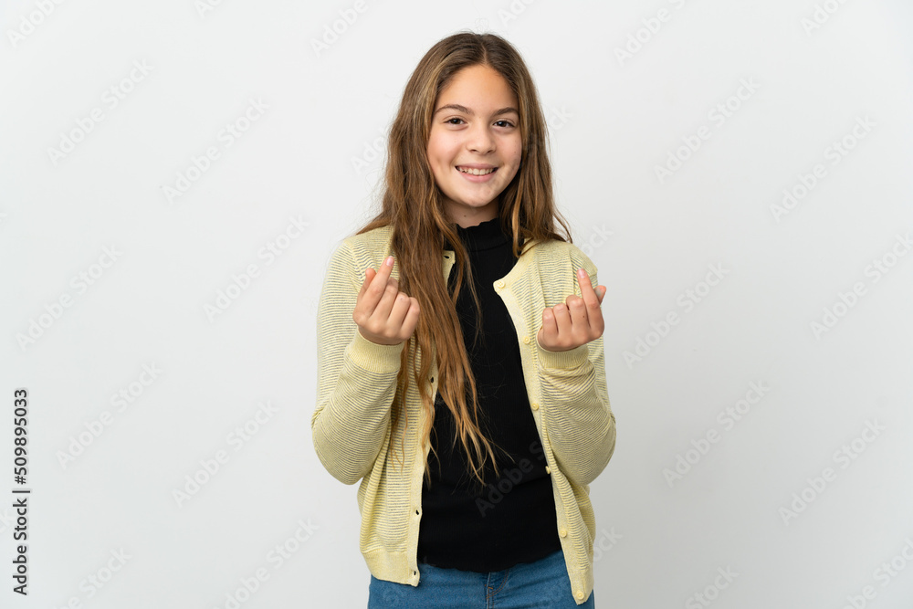 Little girl over isolated white background making money gesture Little girl over isolated white background making money gesture
