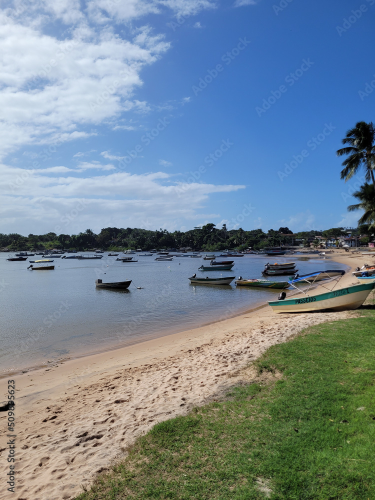 Beautiful fishing village with a river beach full of fishing boats - Praia da Caroa, Itacaré, Bahia, Brazil