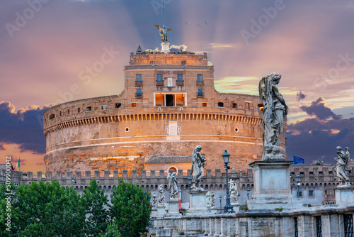 Castel Sant'Angelo and its statues at sunrise, Rome, Italy photo