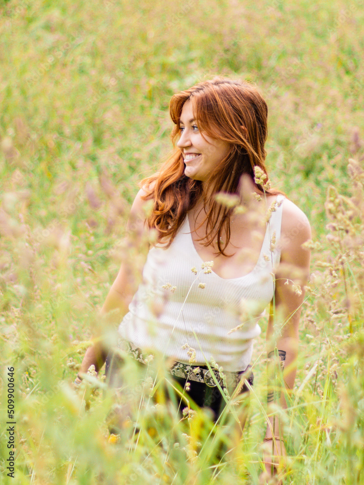 Girl on flower field, young woman, beautiful outdoors portrait. Girl on flower field, young woman, beautiful outdoors portrait.