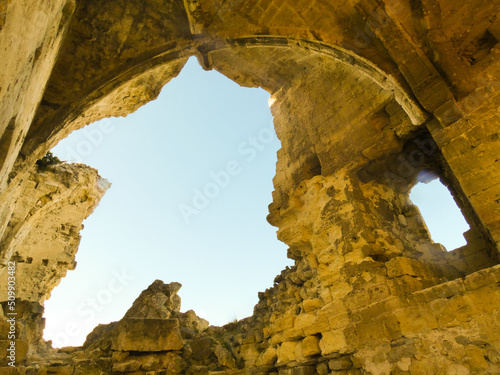 Interior of the ruins of the castle of Queen Jeanne near Eyguieres in the Alpilles in Provence in France, sections of wall and ceiling have collapsed creating a hole resembling the shape of France  photo