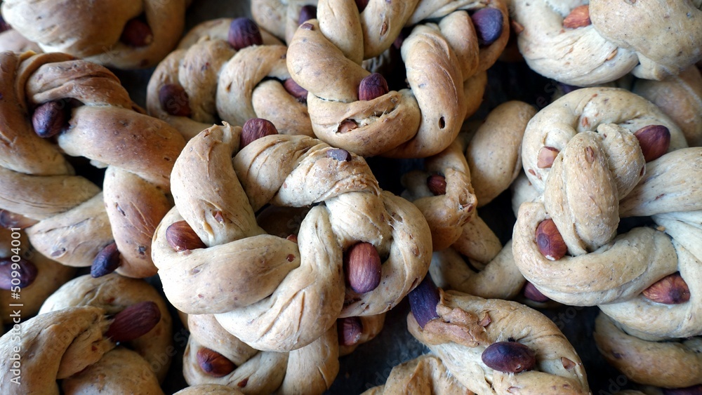 Taralli, donut-shaped savory biscuits with lard, pepper and almonds, typical of the southern regions of Italy. Especially in Naples in Campania. Taralli, donut-shaped savory biscuits with lard, pepper and almonds, typical of the southern regions of Italy. Especially in Naples in Campania.