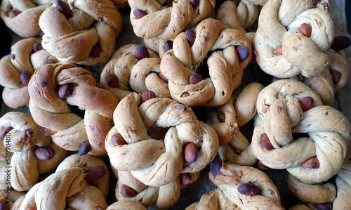 Taralli, donut-shaped savory biscuits with lard, pepper and almonds, typical of the southern regions of Italy. Especially in Naples in Campania. photo
