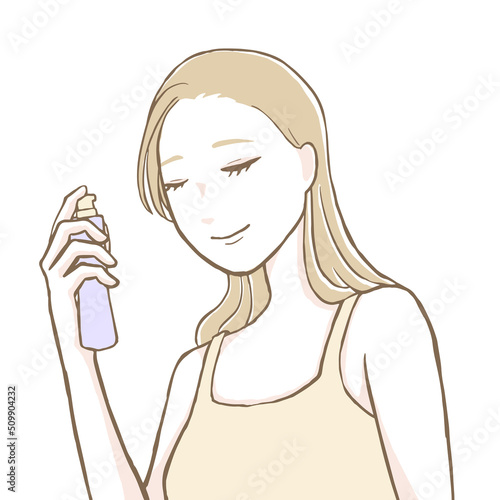 スキンケアをする女性（スプレー）