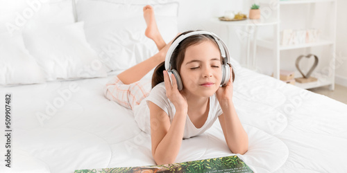 Little girl with headphones...