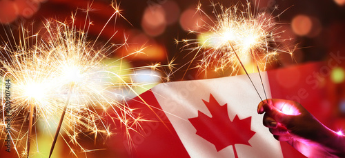 Fotografía Collage with Canadian flag and sparklers. Canada Day celebration
