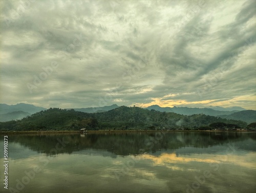 clouds over lake. photo of the nature of the Siman reservoir, Kediri, East Java in the afternoon