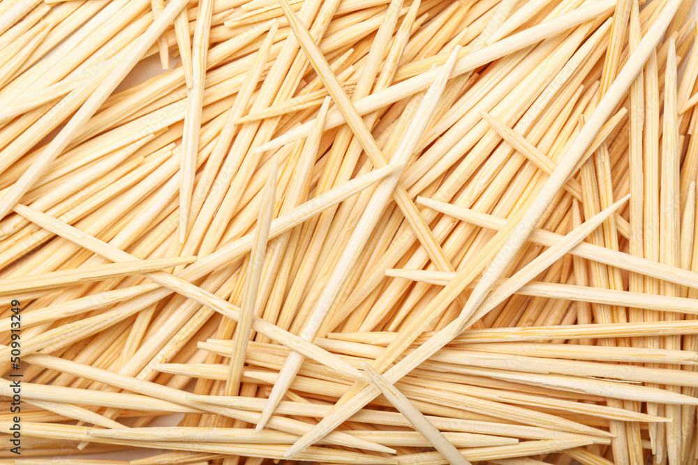Bamboo toothpicks as background, closeup Bamboo toothpicks as background, closeup