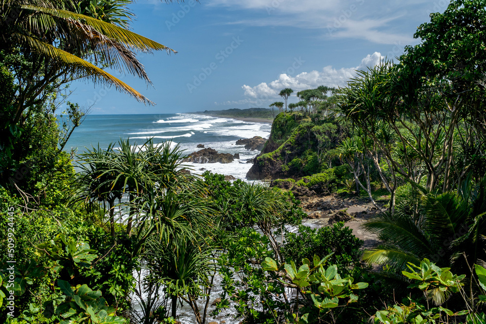 Natural view of the coast in Indonesia when the weather is sunny. Karang Tawulan beach tourism in Indonesia