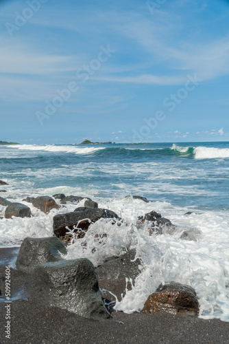 Natural view of the coast in Indonesia when the weather is sunny. Karang Tawulan beach tourism in Indonesia photo