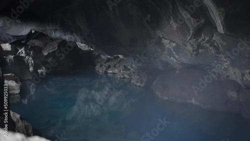 Grjotagja Volcanic Cave With Clear Blue Hot Thermal Water Near Lake Myvatn photo