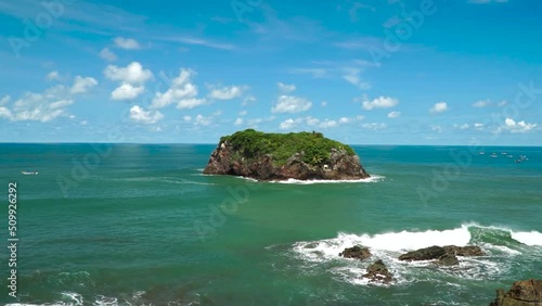 View of the ocean waves on the Karang Tawulan beach, Indonesia photo