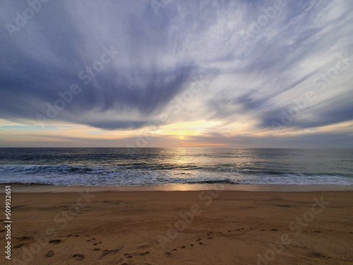 sunset on the beach © mauricio