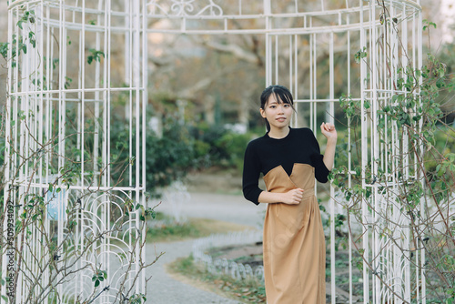 愛知県名古屋市の鶴舞公園を散歩している若い女性 Young woman walking in Tsurumai Park, Nagoya, Aichi, Japan. photo