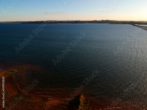 view of sunset in the Jurumirim lake dam water reservoir in Avare, state of Sao Paulo photo