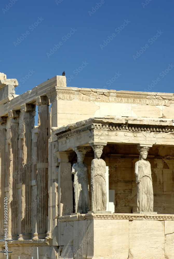 Columns carved as statues of a woman on a temple in Athens, Greece