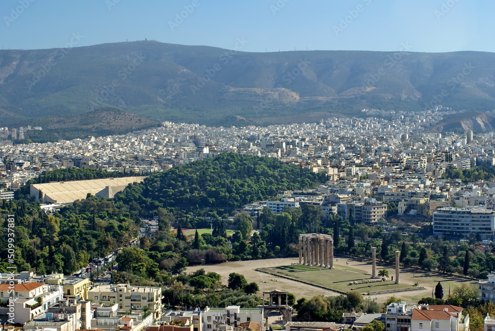 Overhead view of Athens, Greece, with a park with ancient columns in the center