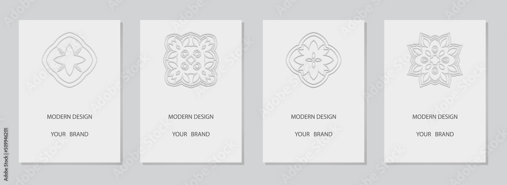 Naklejka premium Cover set, vertical templates. Collection of white backgrounds with 3d relief pattern. Ethnic logo, monogram, emblem in the traditional style of the peoples of the East, Asia, India, Mexico, Aztecs.