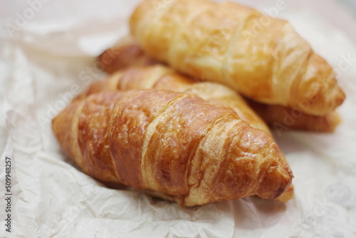 Delicious fresh croissants arranged on a plate © Birch Photography