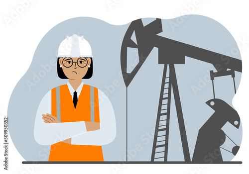 Oil refinery engineer. A female worker in front of a pumping unit for oil extraction, oil drilling and well repair.