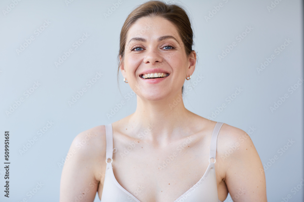 Smiling woman with naked shoulders. Long hair and short hair dress. Smiling woman with naked shoulders. Long hair and short hair dress.