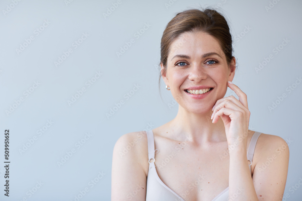 Smiling woman with naked shoulders. Long hair and short hair dress. Smiling woman with naked shoulders. Long hair and short hair dress.