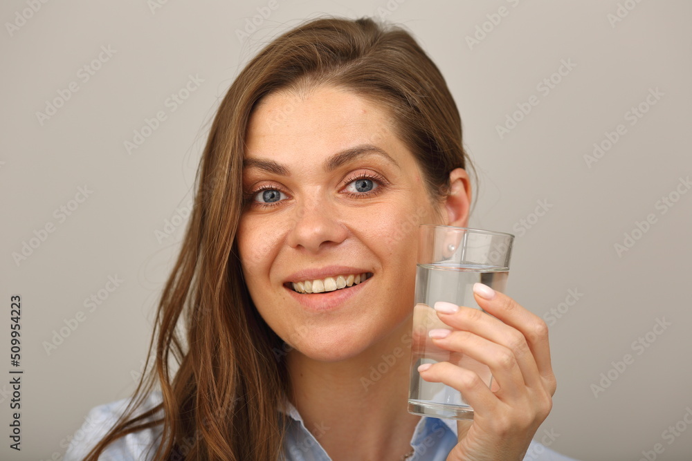 Woman face with water glass close up isolated portrait. Woman face with water glass close up isolated portrait.