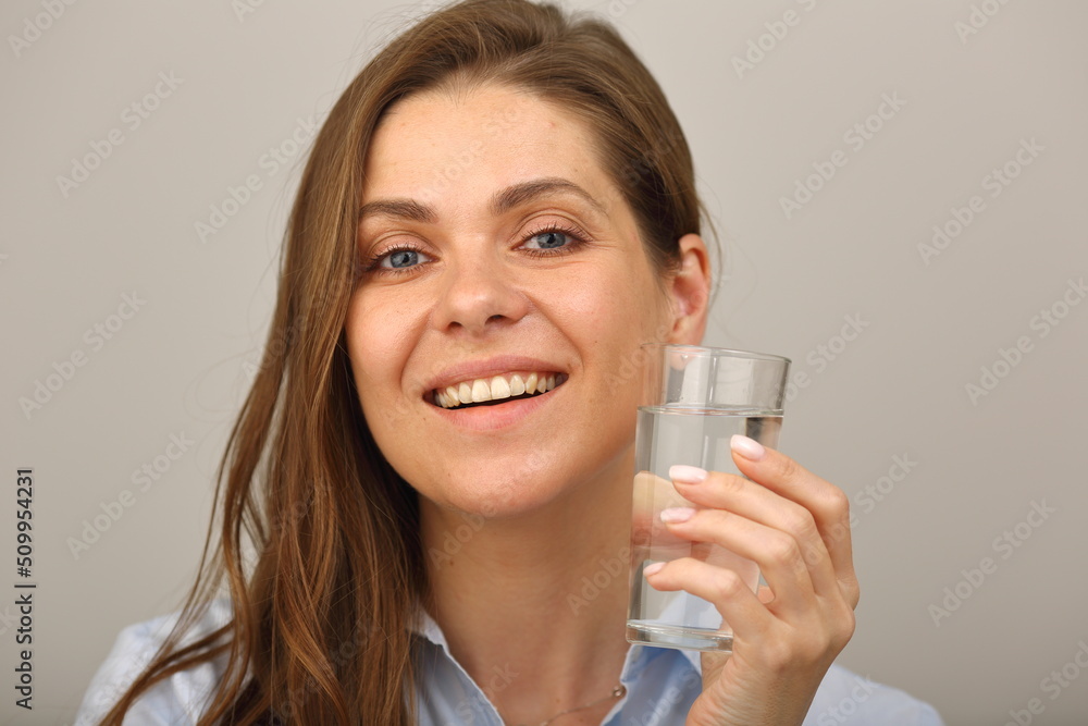Woman face with water glass close up isolated portrait. Woman face with water glass close up isolated portrait.