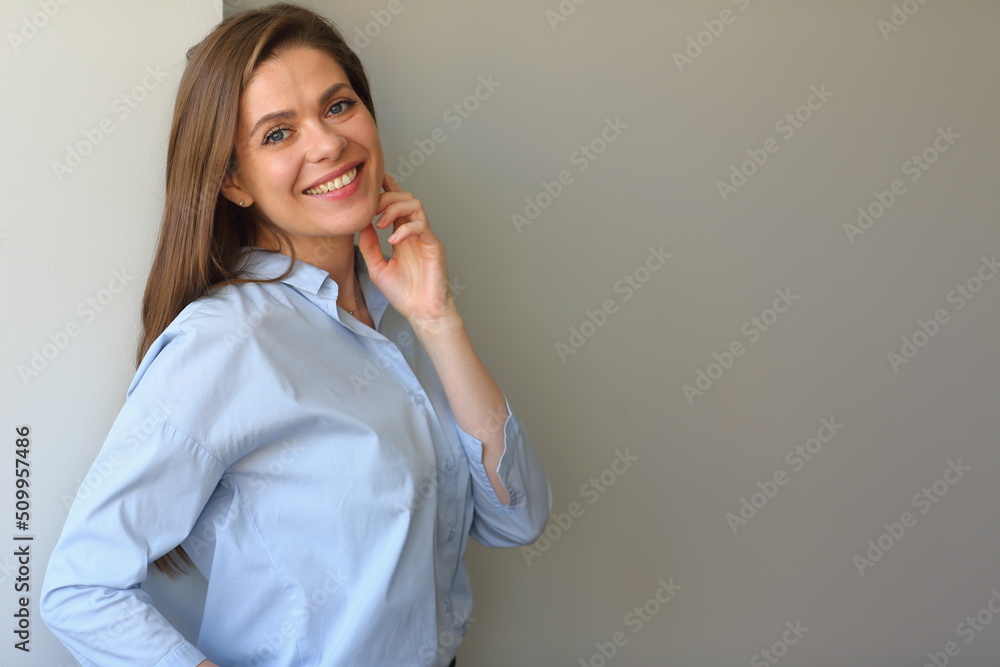 Young smiling business woman touch her chin. isolated portrait. Young smiling business woman touch her chin. isolated portrait.