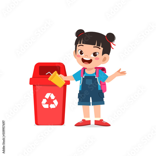 little kid throw trash to trash bin
