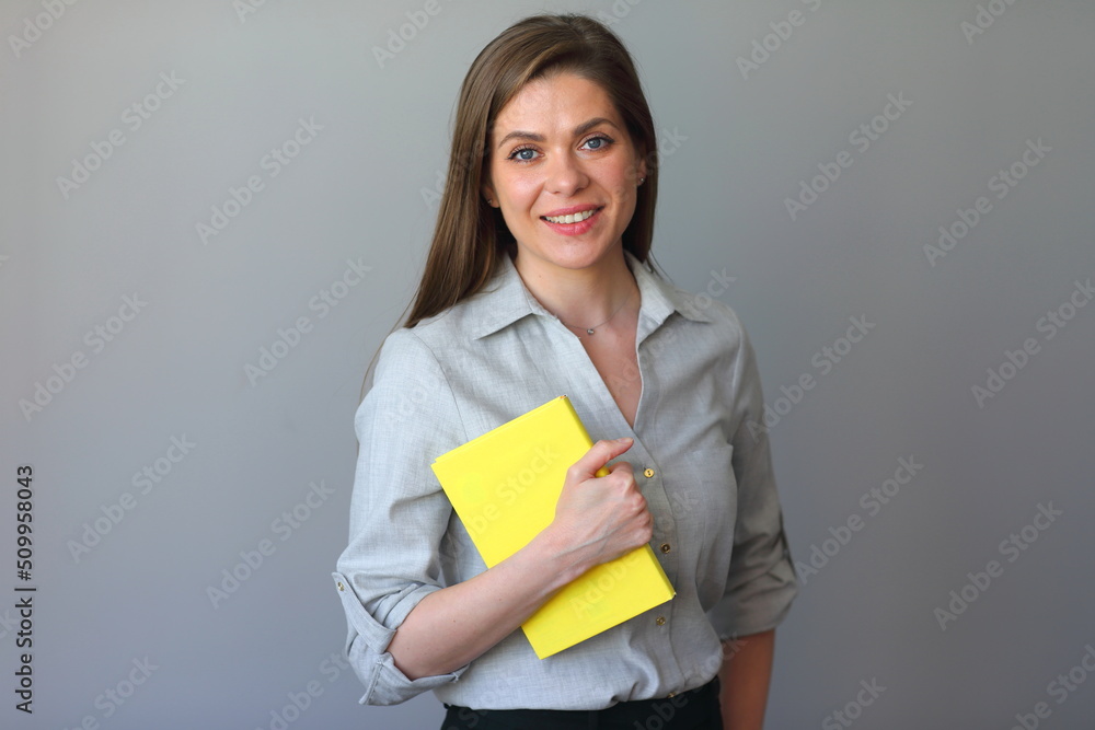 Teacher woman holding book. Isolated portrait. Teacher woman holding book. Isolated portrait.