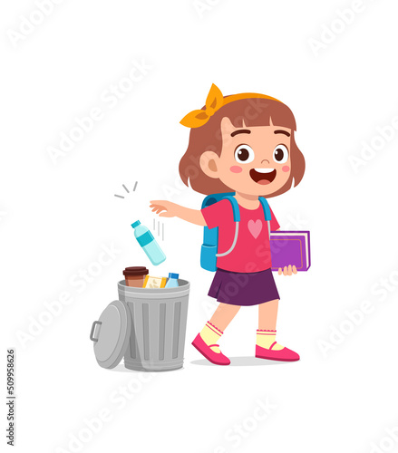 little kid throw trash to trash bin