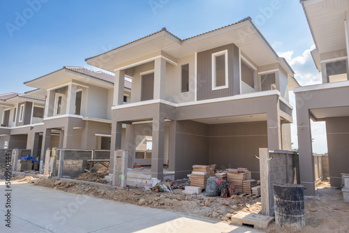 Fotografering construction residential new house in progress at building site housing estate d