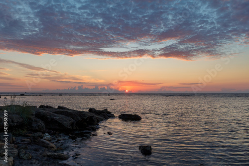 Sunset over the Baltic sea. Rocky coast in Estonia.