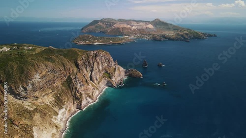 Aeolian Islands. Lipari town aerial view with drone overlooking Vulcano island from Quattrocchi Belvedere panoramic spot