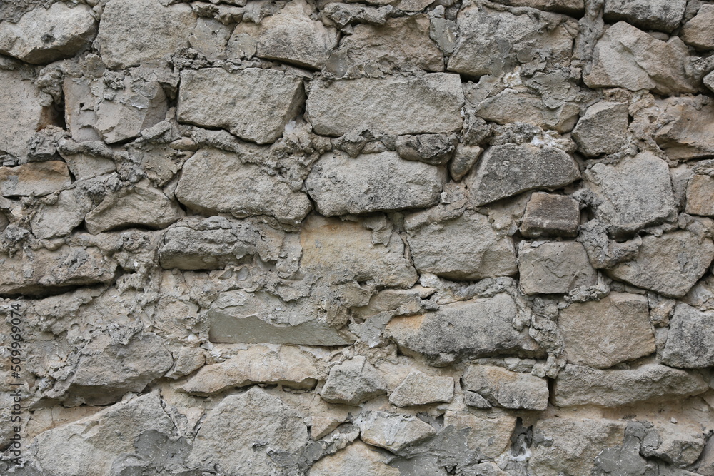 old wall made of light stone. background texture old wall made of light stone. background texture