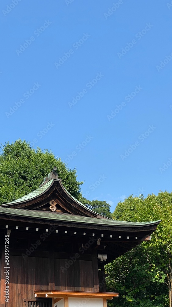 The green roof traditional shrine house of Japan, “Gojyoten Jinjya”, clear blue sky June 10th year 2022