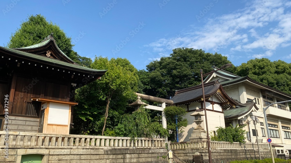 The overall house of Japanese shrine facade, “Gojyoten Jinjya” in Ueno park year 2022 June 10th sunny weekday