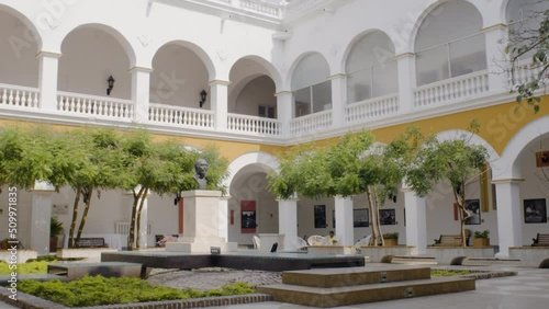 A cinematic view of Centre Gabriel García Marquez in slowmotion. It is located in the heart of historical walled center in Cartagena, guard the mortal remains of the nobel of Colombia. photo