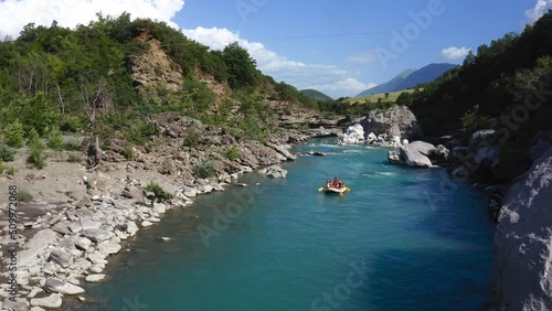 Rafting in clear blue water of Vjosa river, Albania. Summer adventures, extreme sports photo