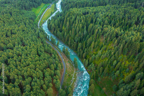 Aerial view of a river crossing a forest near Pahalgam, Jammu and Kashmir, India. photo